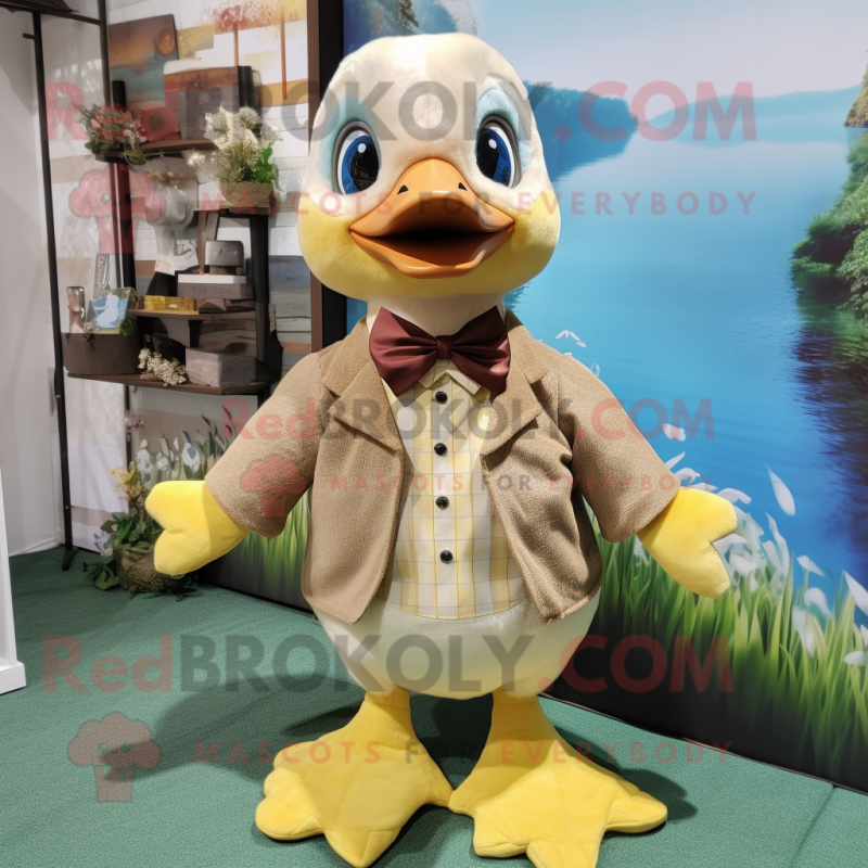 Beige Gosling mascot costume character dressed with a Romper and Bow ties Beige Gosling mascot costume character dressed with a Romper and Bow ties