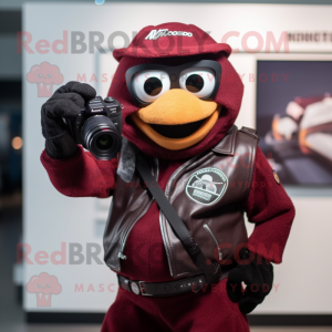 Maroon Camera maskot...