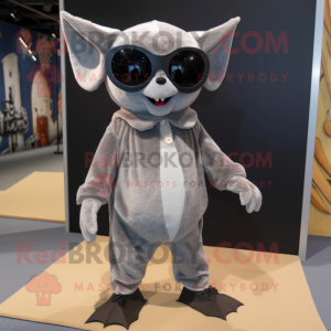 Silver Bat mascot costume character dressed with a Corduroy Pants and Sunglasses