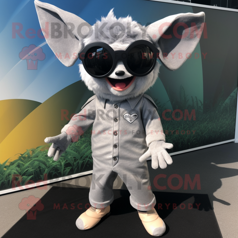 Silver Bat mascot costume character dressed with a Corduroy Pants and Sunglasses Silver Bat mascot costume character dressed with a Corduroy Pants and Sunglasses