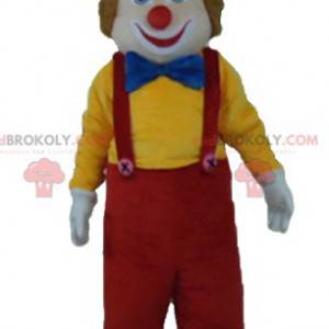 Veelkleurige lachende en schattige clown mascotte -