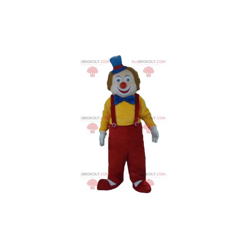 Mascotte de clown multicolore souriant et mignon -