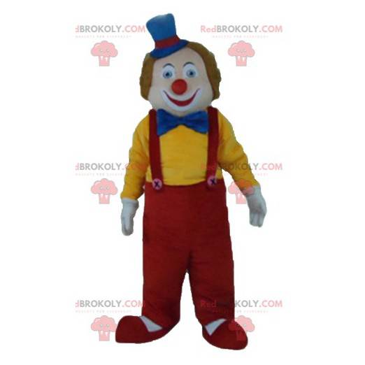 Mascotte de clown multicolore souriant et mignon -