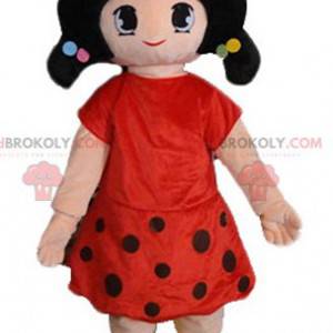 Mascot brunette girl dressed in a red dress with polka dots -