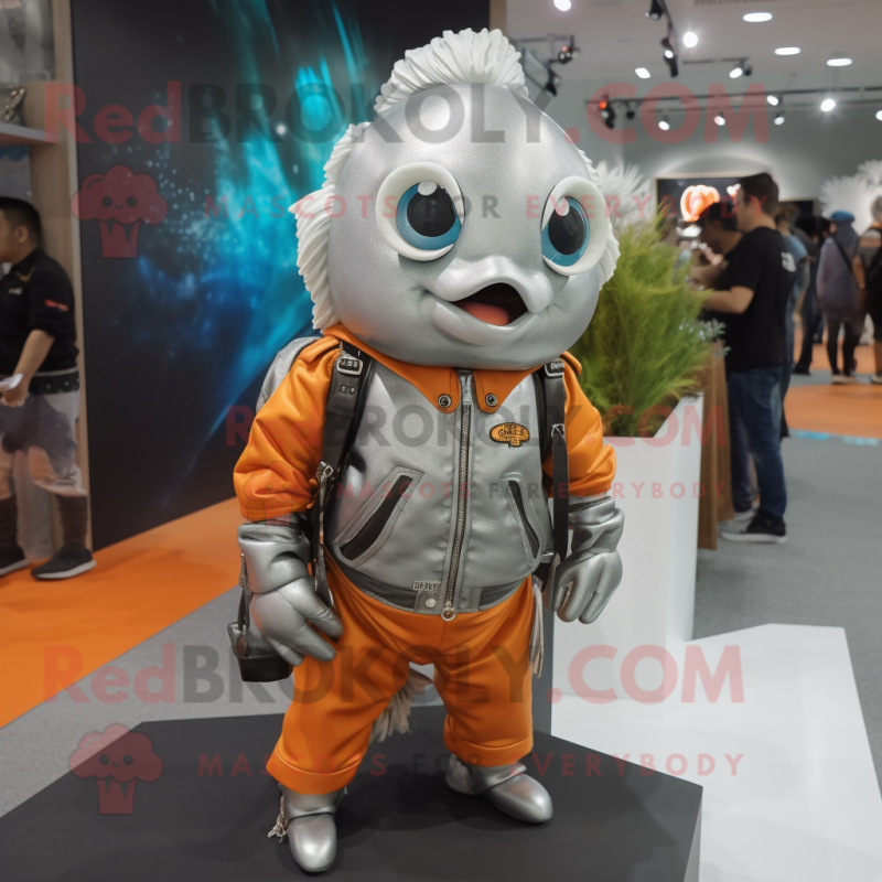 Silver Goldfish mascot costume character dressed with a Leather Jacket and Handbags