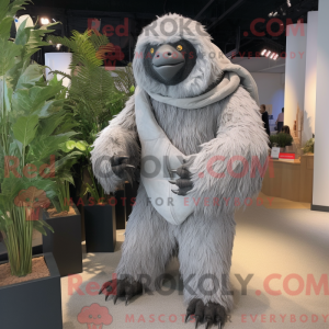 Maskotfigur av en grå...