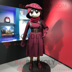 Maskotfigur af en rødbrun...