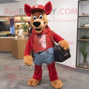 Red Dingo mascot costume character dressed with a Jeans and Briefcases