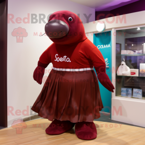 Maroon Stellar'S Sea Cow mascot costume character dressed with a Culottes and Shoe clips