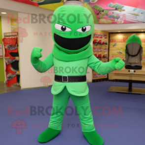 Green Ninja mascot costume character dressed with a Flare Jeans and Shoe clips