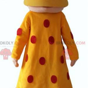 Oriental woman mascot with a yellow dress with red polka dots -