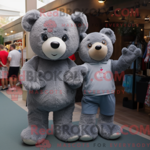 Maskotfigur af en grå bamse...