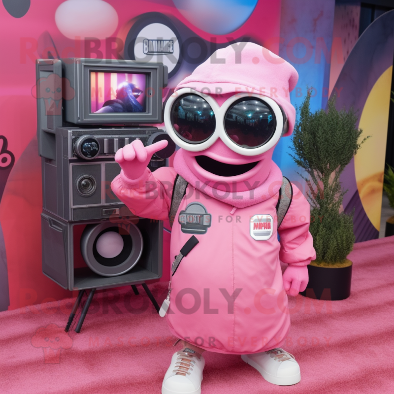 Pink Camera mascot costume character dressed with a Sweatshirt and Sunglasses Pink Camera mascot costume character dressed with a Sweatshirt and Sunglasses