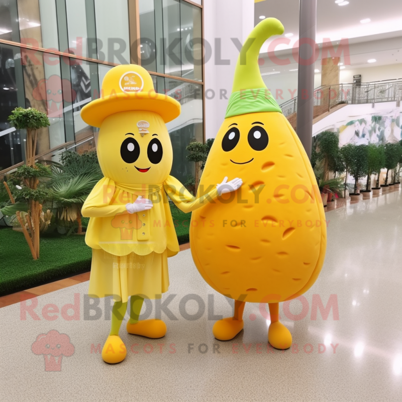 Yellow Melon mascot costume character dressed with a Evening Gown and Berets