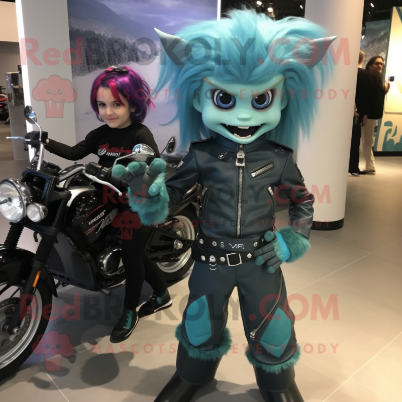 Teal Vampire mascot costume character dressed with a Moto Jacket and Hair clips Teal Vampire mascot costume character dressed with a Moto Jacket and Hair clips