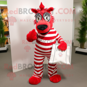 Red Zebra mascot costume character dressed with a Dress Pants and Tote bags