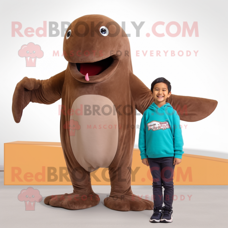 Brown Whale mascot costume character dressed with a Long Sleeve Tee and Shoe clips