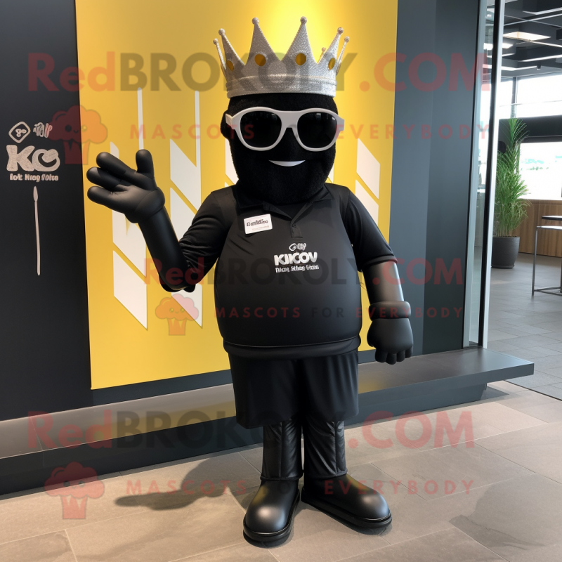 Black King mascot costume character dressed with a Swimwear and Sunglasses Black King mascot costume character dressed with a Swimwear and Sunglasses