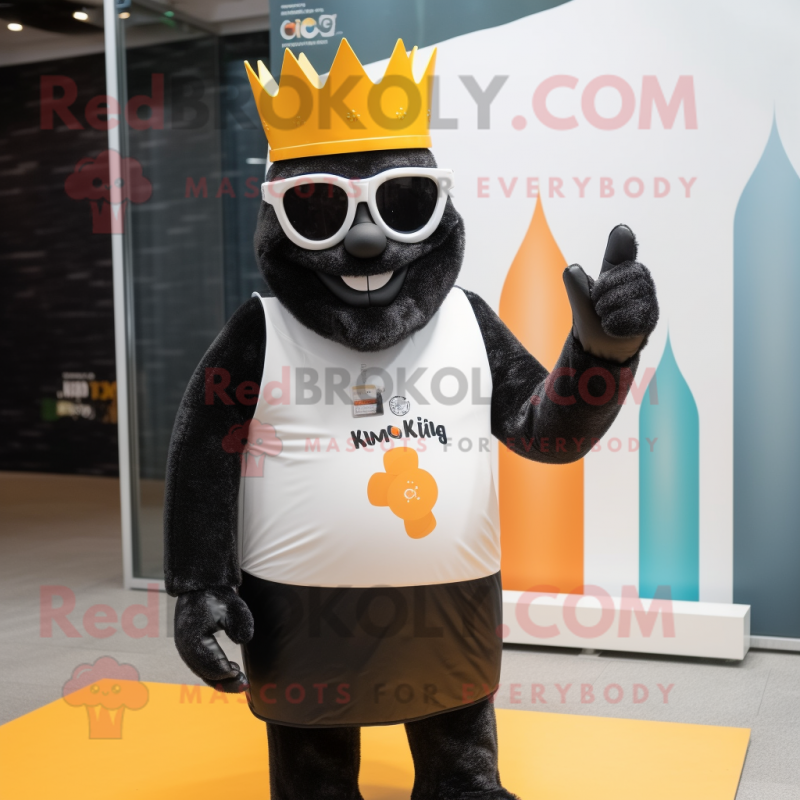 Black King mascot costume character dressed with a Swimwear and Sunglasses