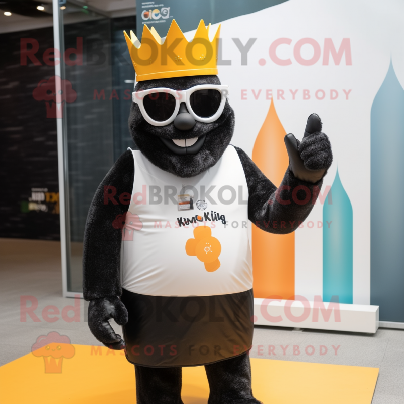 Black King mascot costume character dressed with a Swimwear and Sunglasses Black King mascot costume character dressed with a Swimwear and Sunglasses