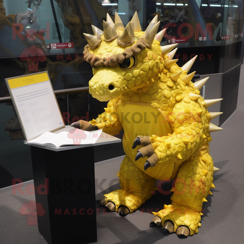 Gold Stegosaurus mascot costume character dressed with a Cover-up and Reading glasses Gold Stegosaurus mascot costume character dressed with a Cover-up and Reading glasses