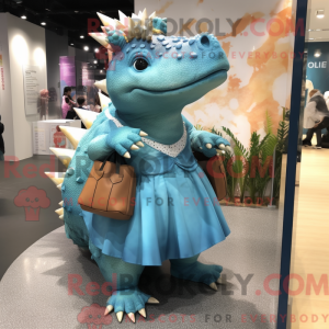 Maskotkarakter af en cyan...