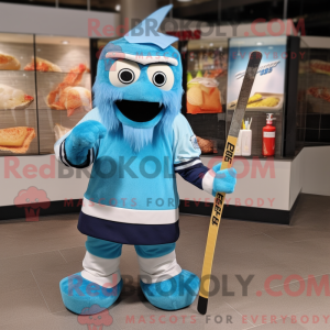 Maskotfigur af en cyan...
