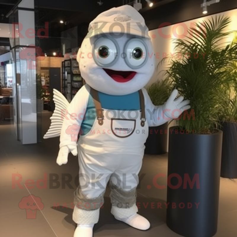 White Fish And Chips mascot costume character dressed with a Dungarees and Backpacks