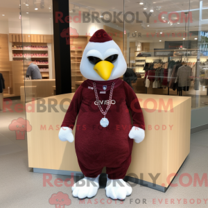 Maskotfigur af en rødbrun...