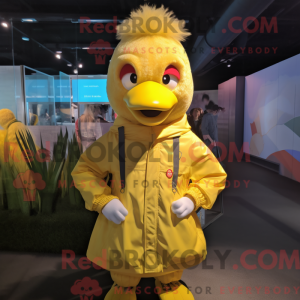 Maskot karakter af en gul...