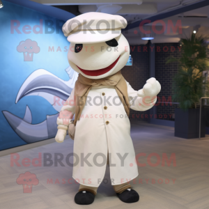 Cream Swordfish mascot costume character dressed with a Waistcoat and Berets