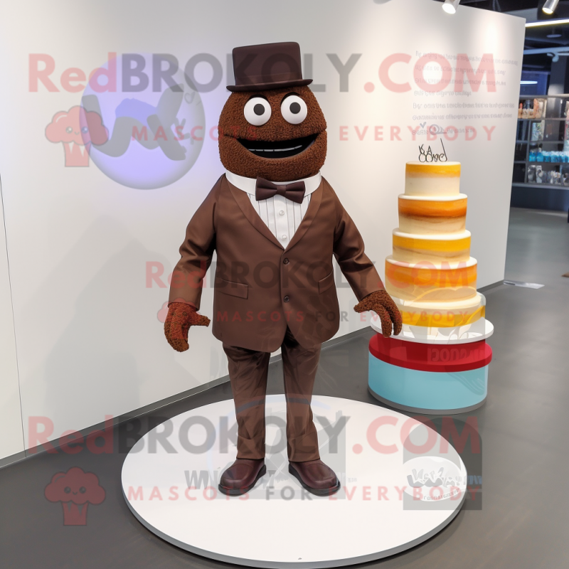 Brown Wedding Cake mascot costume character dressed with a Suit and Shoe laces Brown Wedding Cake mascot costume character dressed with a Suit and Shoe laces