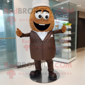 Brown Wedding Cake mascot costume character dressed with a Suit and Shoe laces