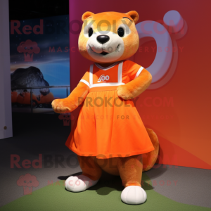 Orange Otter mascot costume character dressed with a Skirt and Shoe laces