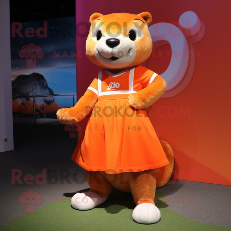 Orange Otter mascot costume character dressed with a Skirt and Shoe laces Orange Otter mascot costume character dressed with a Skirt and Shoe laces