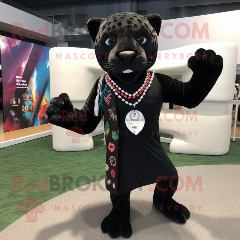 Black Jaguar mascot costume character dressed with a Running Shorts and Shawl pins Black Jaguar mascot costume character dressed with a Running Shorts and Shawl pins