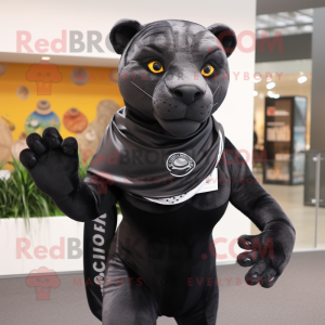 Black Jaguar mascot costume character dressed with a Running Shorts and Shawl pins