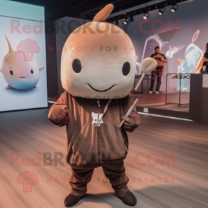 Brown Narwhal mascot costume character dressed with a Hoodie and Lapel pins