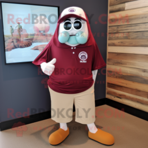 Maroon Oyster mascot costume character dressed with a Polo Shirt and Watches