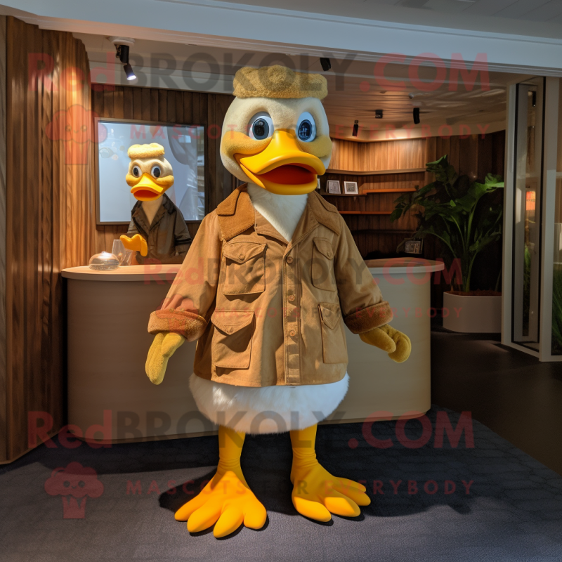 Tan Duck mascot costume character dressed with a Corduroy Pants and Brooches