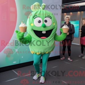 Maskot karaktär av en grön...