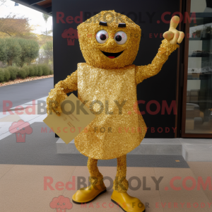 Maskot karakter af en guld...
