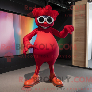 Maskot karakter af en rød...