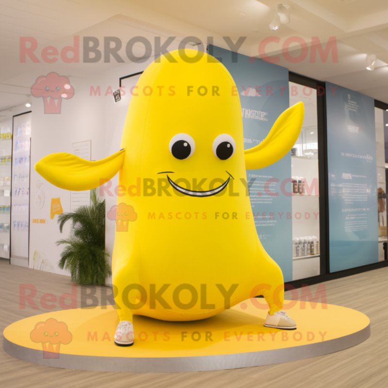 Yellow Whale mascot costume character dressed with a Yoga Pants and Necklaces