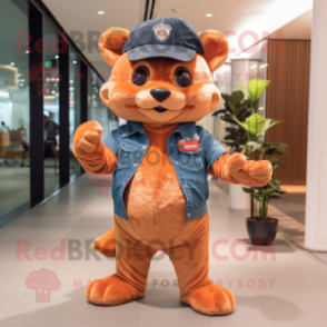 Peach Jaguarundi mascot costume character dressed with a Flare Jeans and Berets