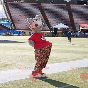 Gray wolf mascot with floral pants and a red t-shirt -