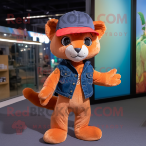 Peach Jaguarundi mascot costume character dressed with a Flare Jeans and Berets