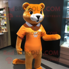 Orange Jaguarundi mascot costume character dressed with a One-Piece Swimsuit and Lapel pins