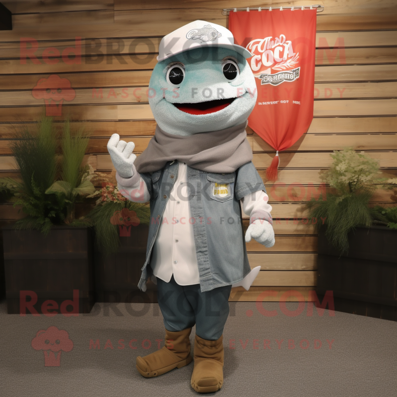 Silver Cod mascot costume character dressed with a Overalls and Shawl pins