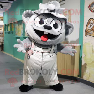 Silver Cod mascot costume character dressed with a Overalls and Shawl pins